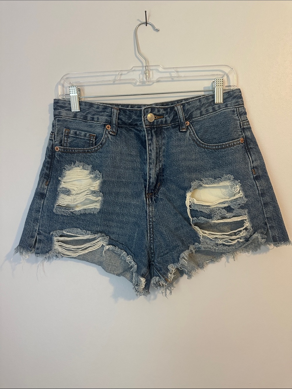 High-Rise Distressed Jean Shorts in Dark Blue Size 7/28